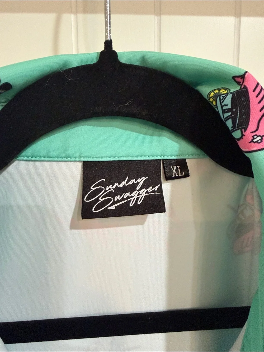 Sleeveless Mint Green Polo Tank with Pink Flamingo Float Motif. Great for golf